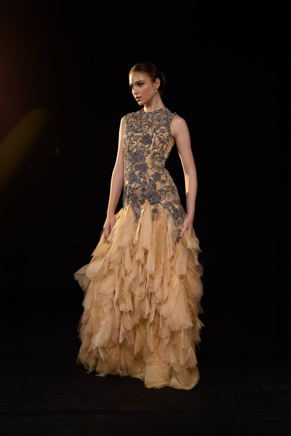 Beige Sleeveless Gown With Floral Allique Detailing And Voluminous Layered Tulle