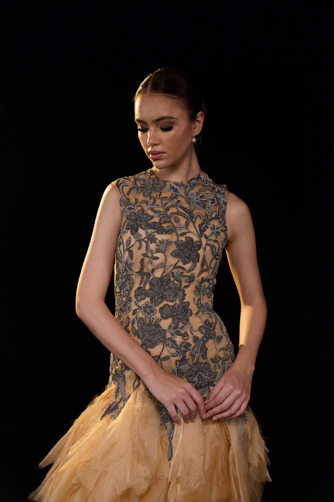 Beige Sleeveless Gown With Floral Allique Detailing And Voluminous Layered Tulle