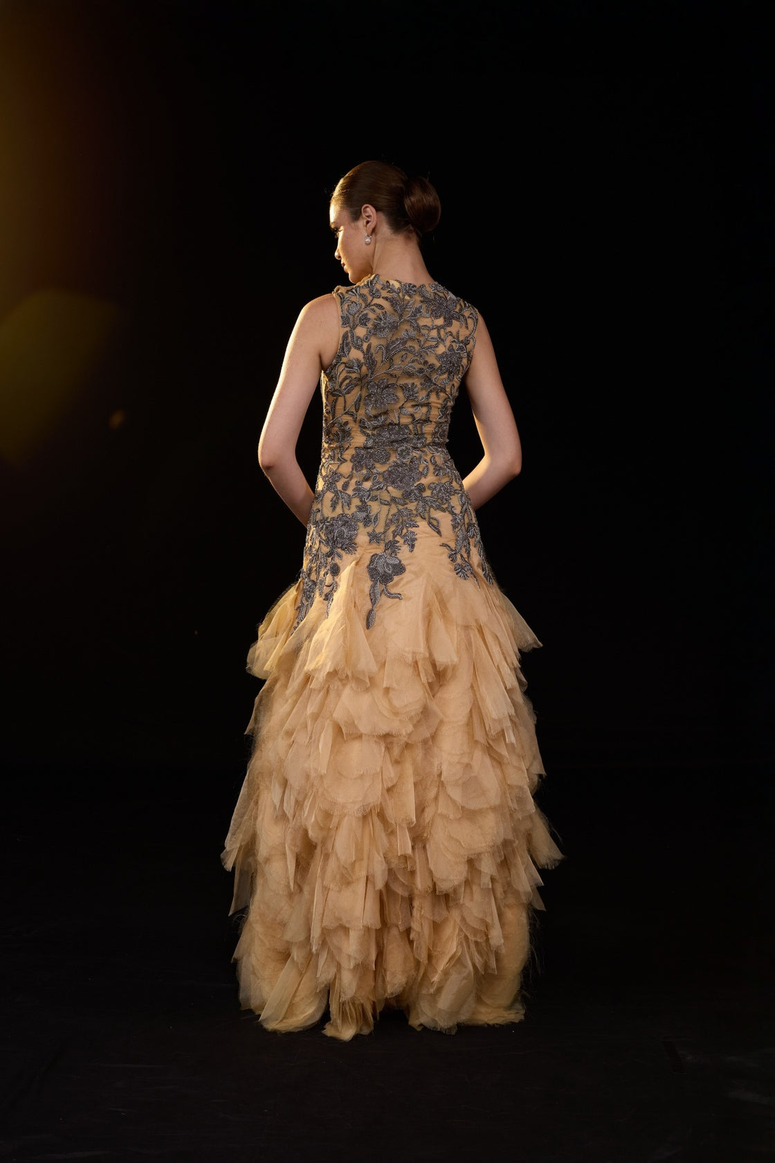 Beige Sleeveless Gown With Floral Allique Detailing And Voluminous Layered Tulle