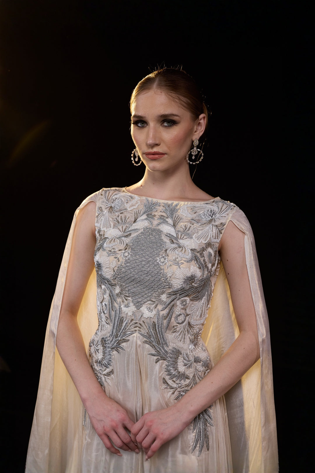 Ivory Draped Gown Embellished With Silver Embroidery And Flowing Draped Sleeves