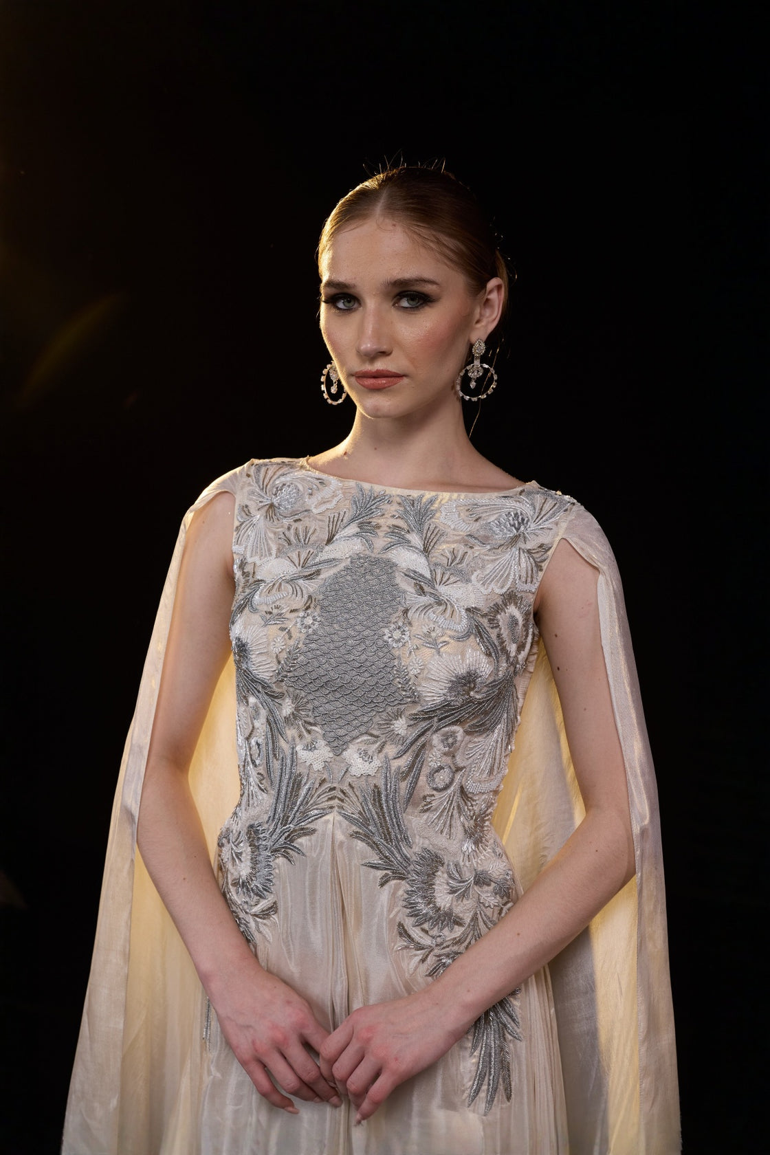 Ivory Draped Gown Embellished With Silver Embroidery And Flowing Draped Sleeves
