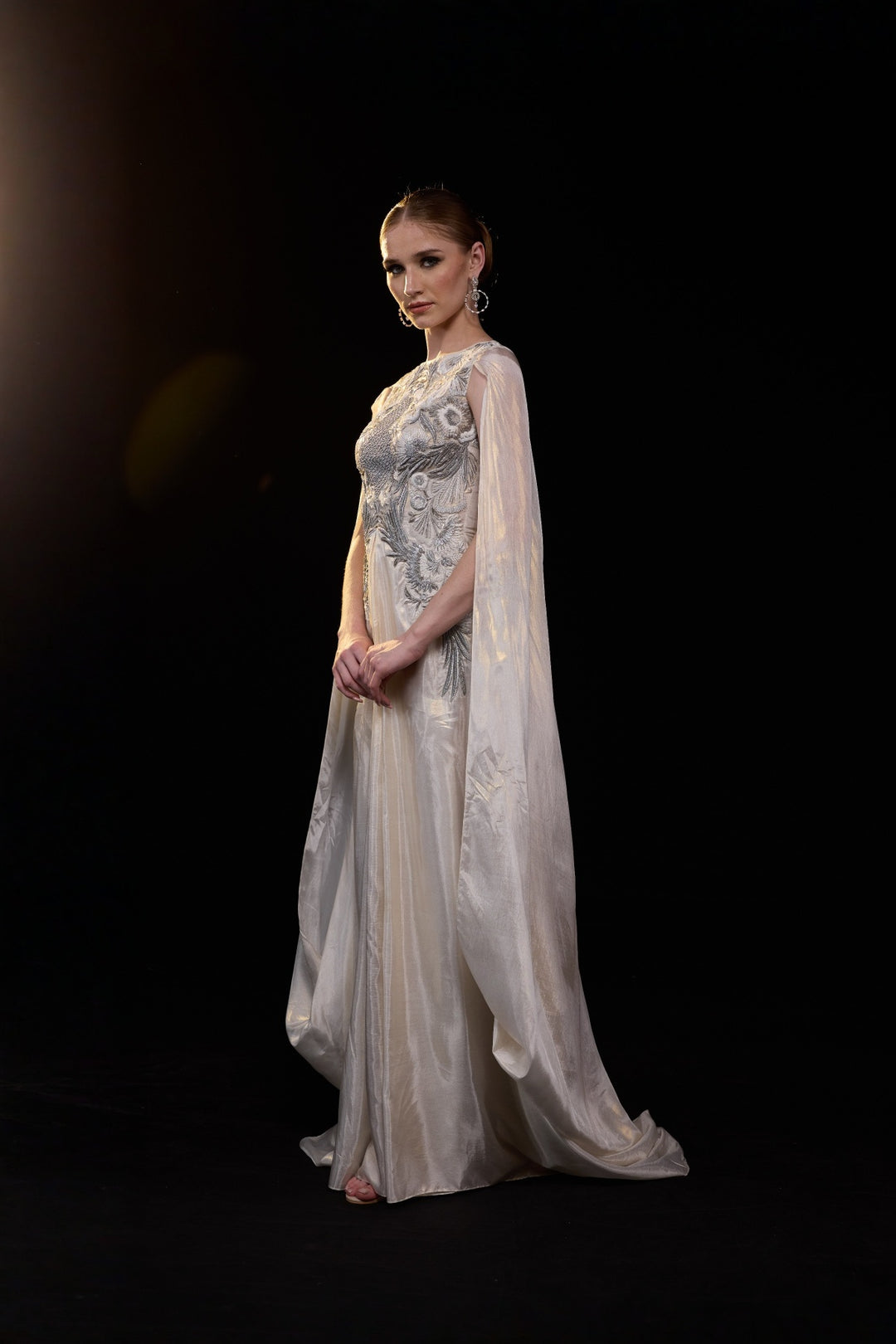 Ivory Draped Gown Embellished With Silver Embroidery And Flowing Draped Sleeves