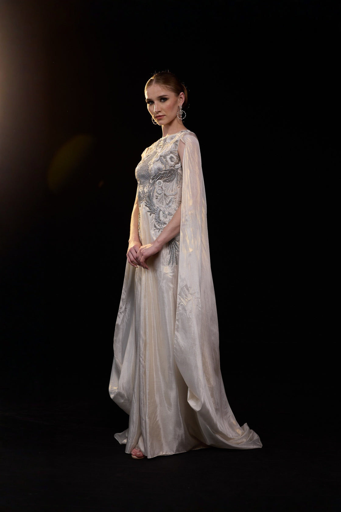 Ivory Draped Gown Embellished With Silver Embroidery And Flowing Draped Sleeves