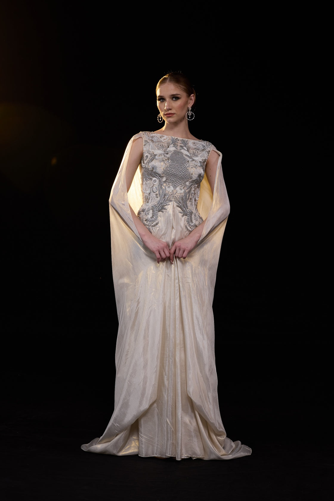 Ivory Draped Gown Embellished With Silver Embroidery And Flowing Draped Sleeves