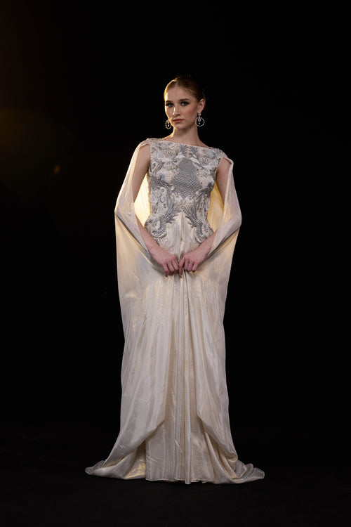 Ivory Draped Gown Embellished With Silver Embroidery And Flowing Draped Sleeves