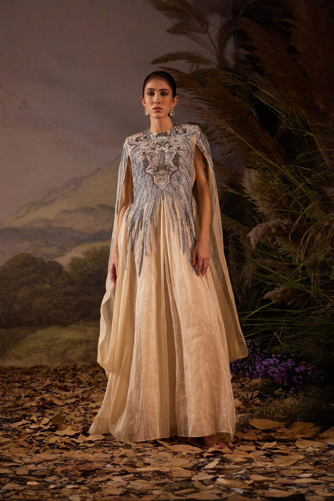 Champagne Cape Gown With Silver Embellishment And Sculpted Bodice
