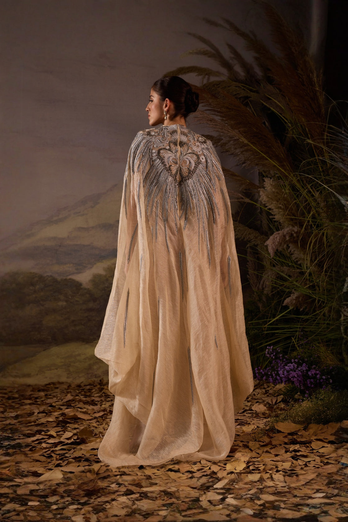 Champagne Cape Gown With Silver Embellishment And Sculpted Bodice