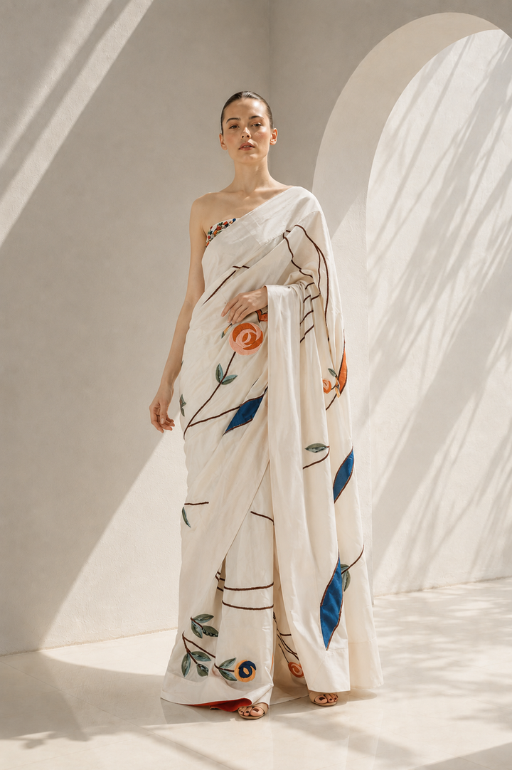 Ivory saree with corset elegance