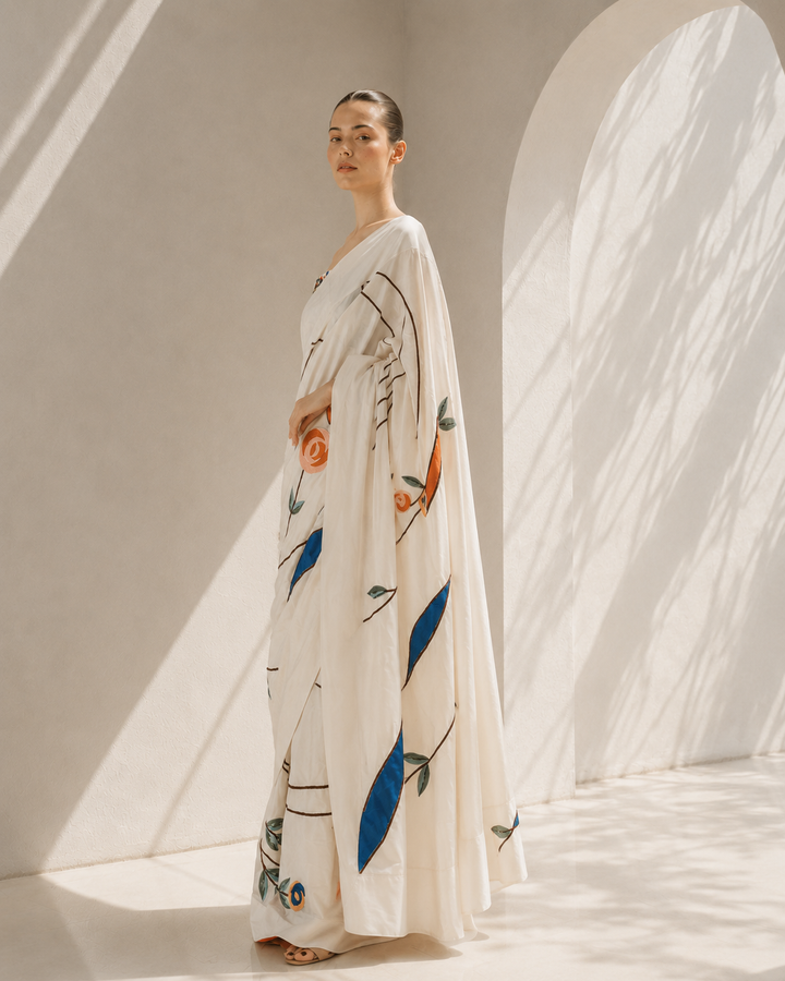 Ivory saree with corset elegance