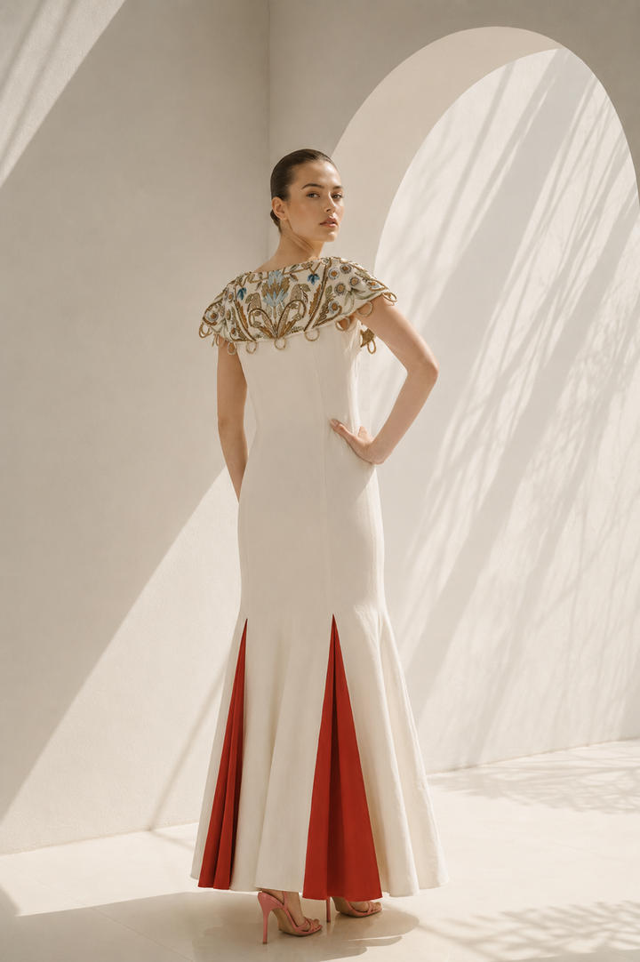 Ivory Gown With Vibrant Red Accents