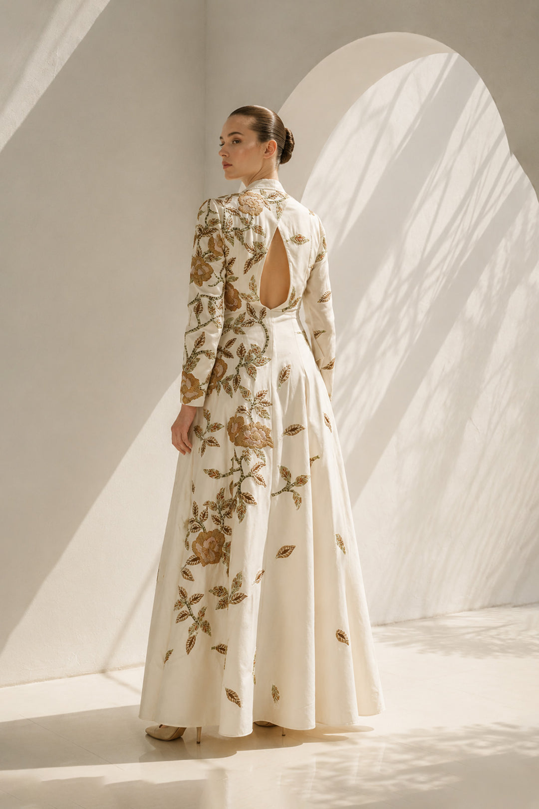 Ivory Gown With Cape-Like Elegance