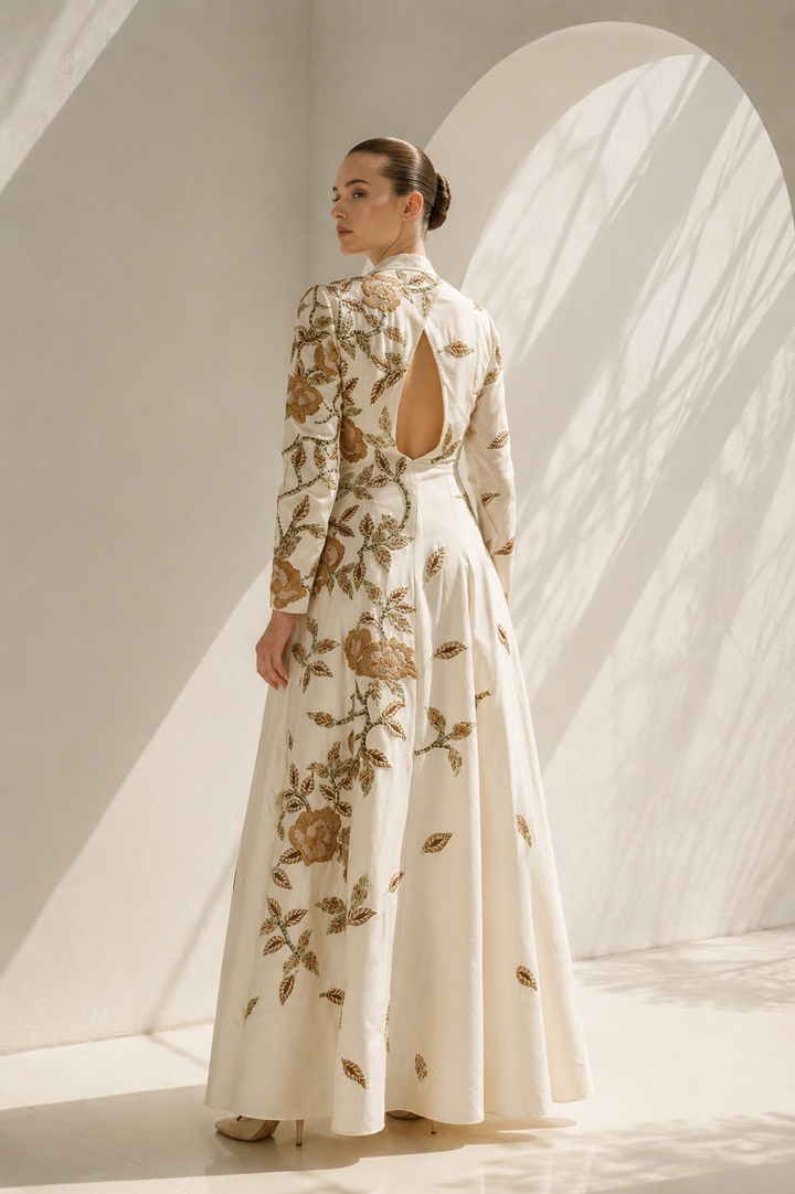 Ivory Gown With Cape-Like Elegance