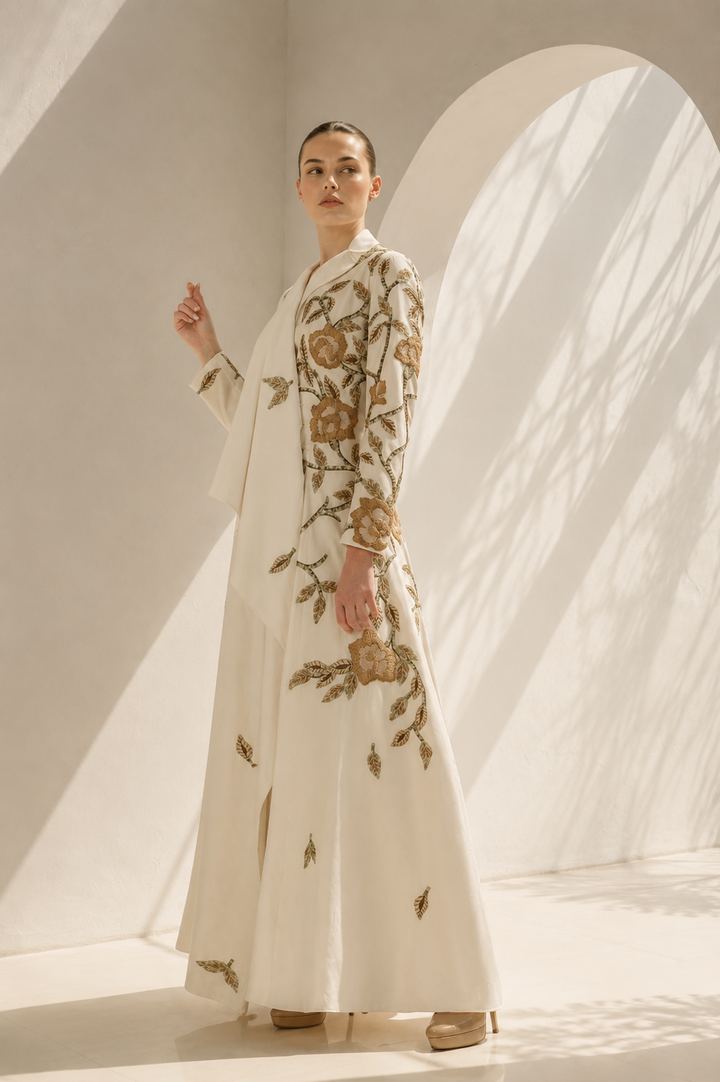 Ivory Gown With Cape-Like Elegance