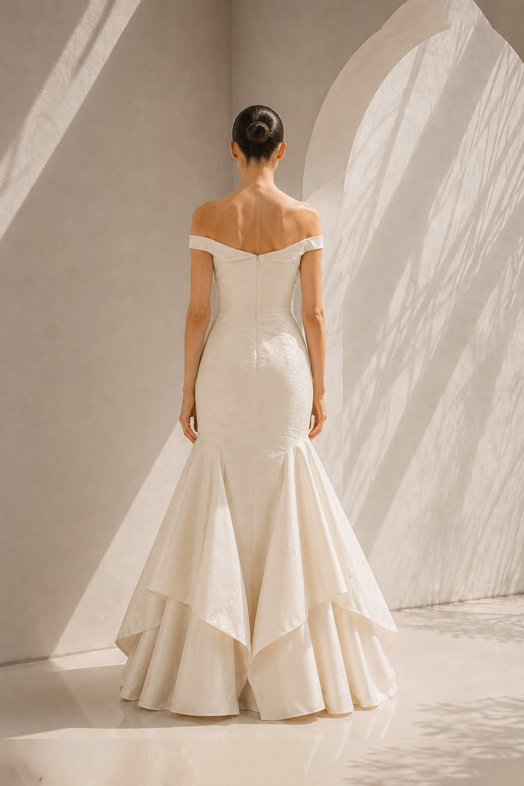 Ivory Off-Shoulder Gown With Dramatic Flair