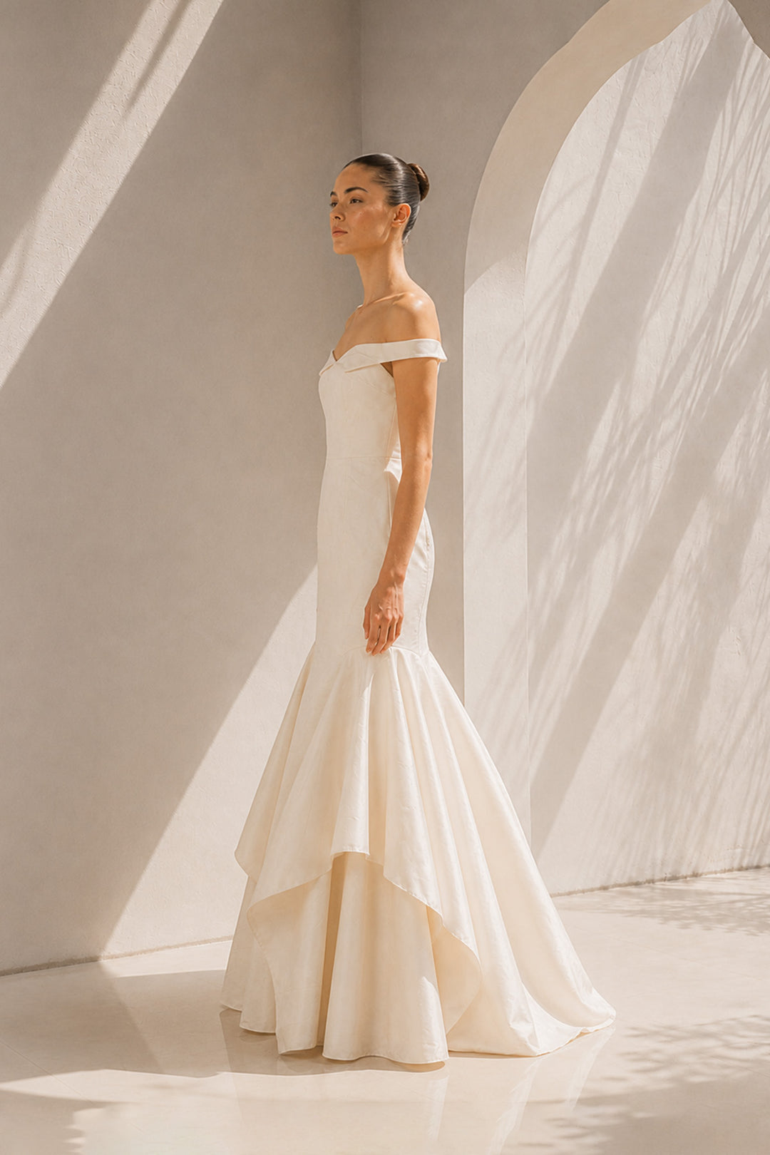 Ivory Off-Shoulder Gown With Dramatic Flair