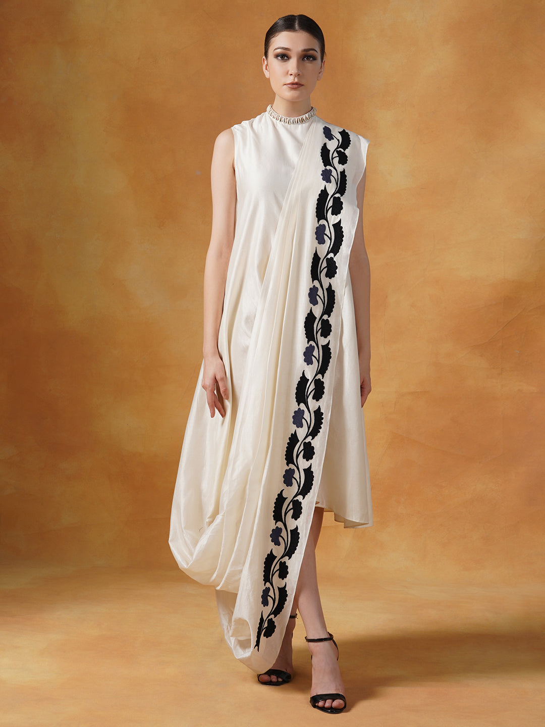 Embroidered bohemian style long jacket in linen silk, topped on an ivory cotton silk drape dress