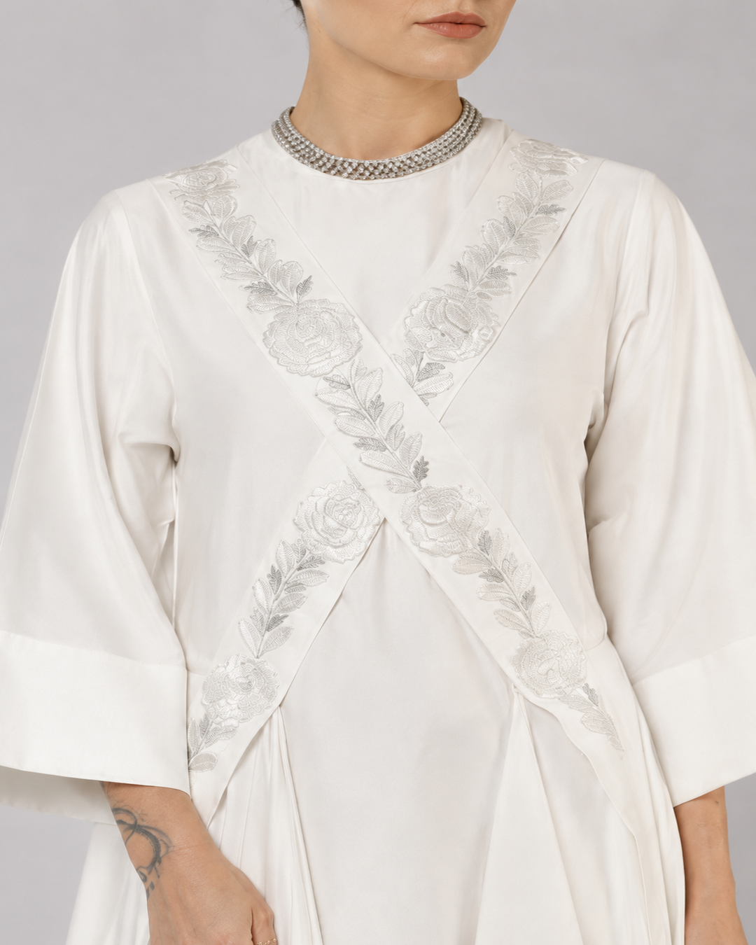 Ivory Draped Overlay Dress With Tonal Floral Embroidery, Cascading Panels, And Relaxed Statement Sleeves.