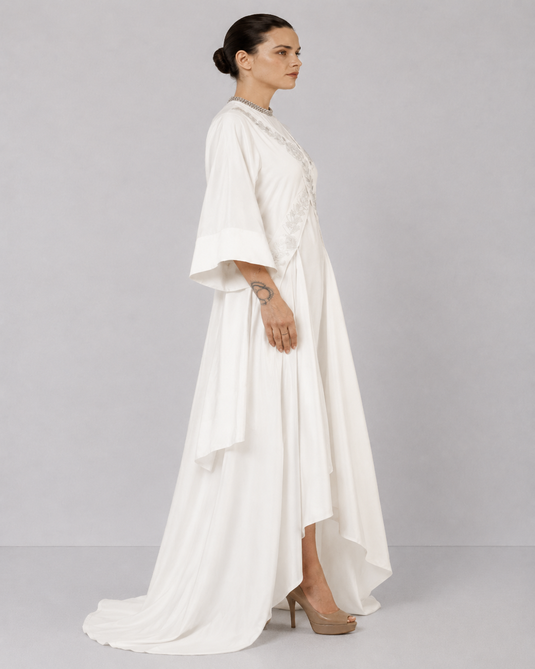 Ivory Draped Overlay Dress With Tonal Floral Embroidery, Cascading Panels, And Relaxed Statement Sleeves.