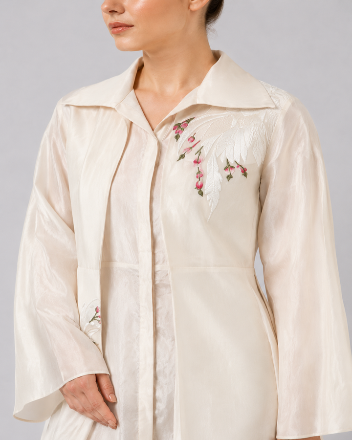 Ivory Layered Ensemble With Embroidered Accents And Fluid Draped Silhouette