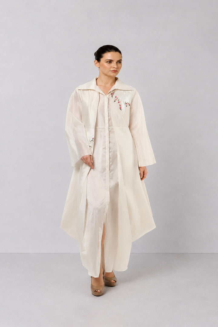 Ivory Layered Ensemble With Embroidered Accents And Fluid Draped Silhouette