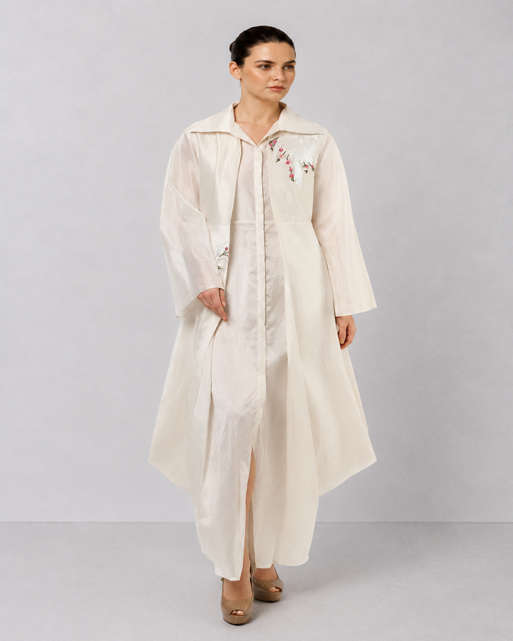 Ivory Layered Ensemble With Embroidered Accents And Fluid Draped Silhouette