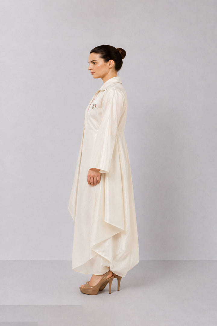 Ivory Layered Ensemble With Embroidered Accents And Fluid Draped Silhouette