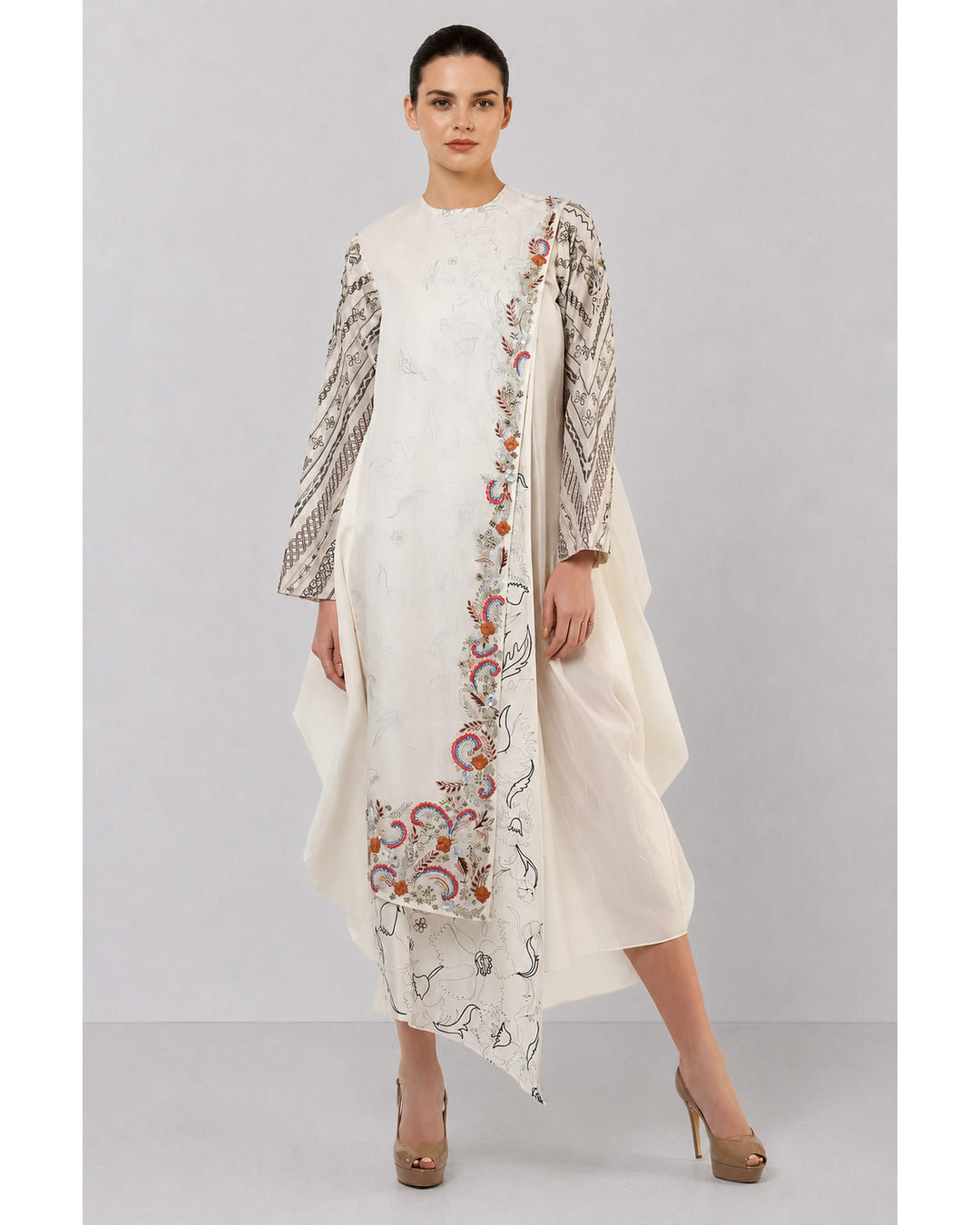 Ivory one-side pleated embroidered dress with asymmetrical hem.