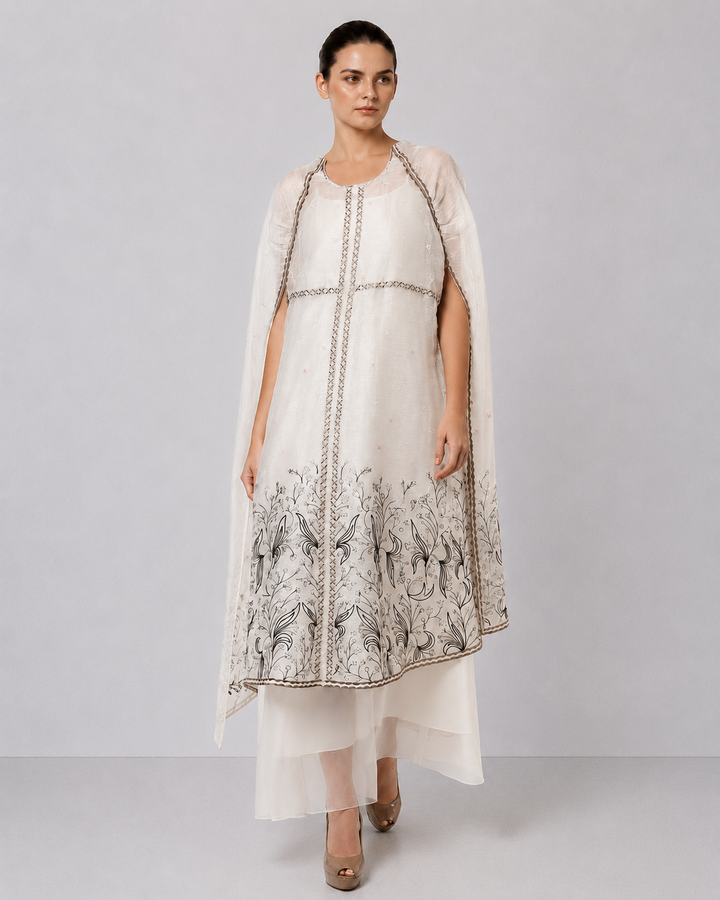 Ivory Embroidered Cape Dress With Sheer Layering And Floral Motifs.