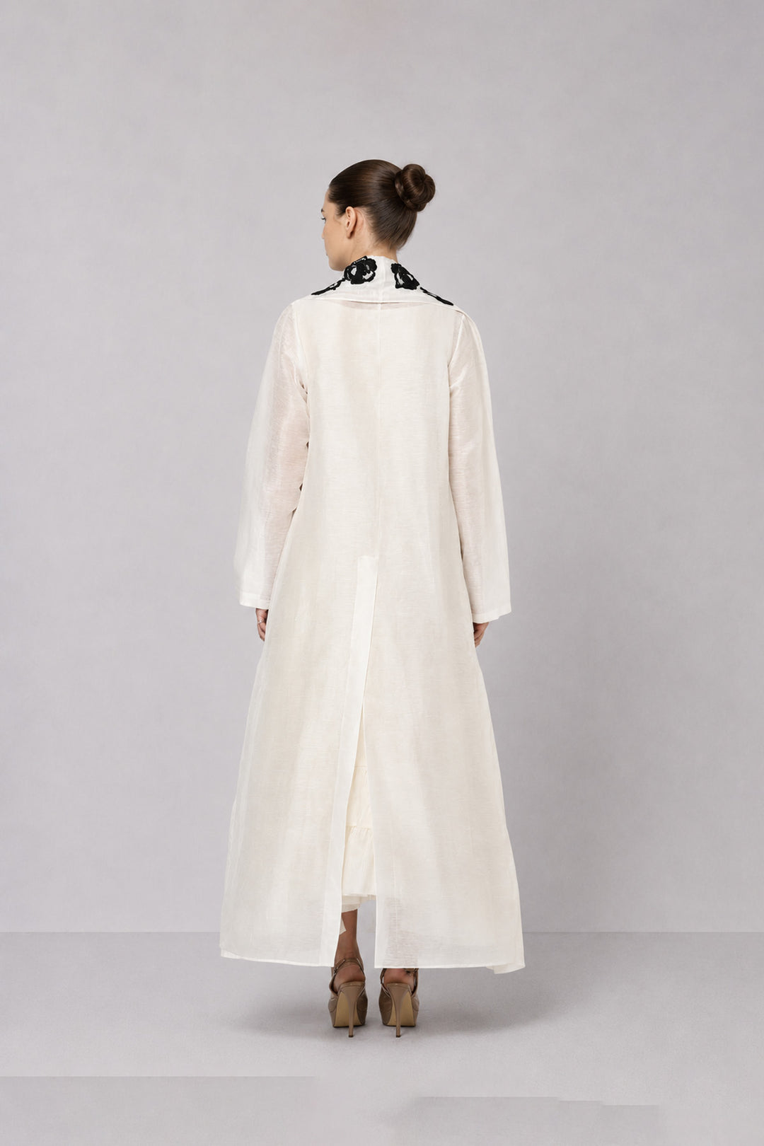 Ivory Tiered Dress With Floral Embroidered Bodice And Statement Applique Jacket.
