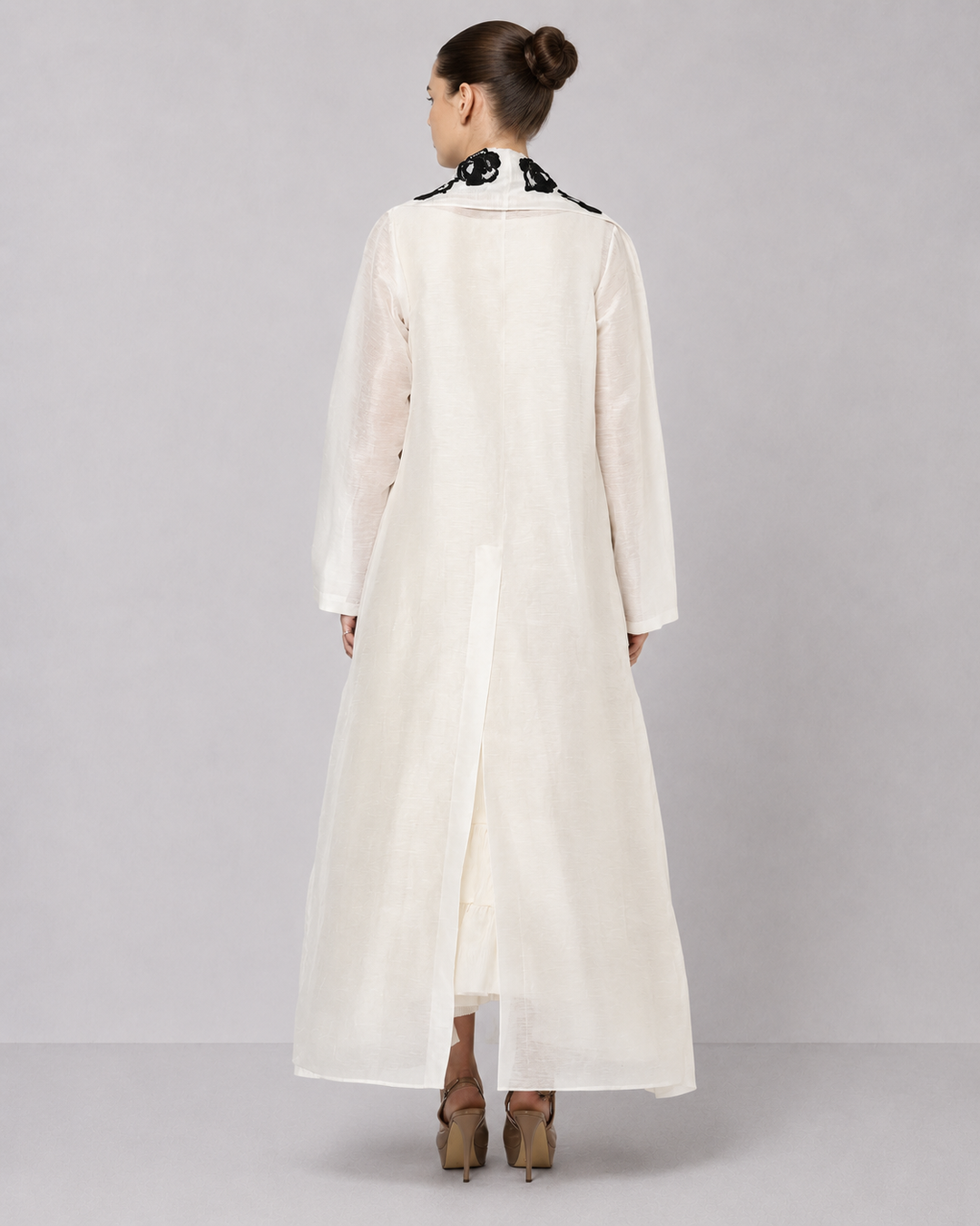 Ivory Tiered Dress With Floral Embroidered Bodice And Statement Applique Jacket.