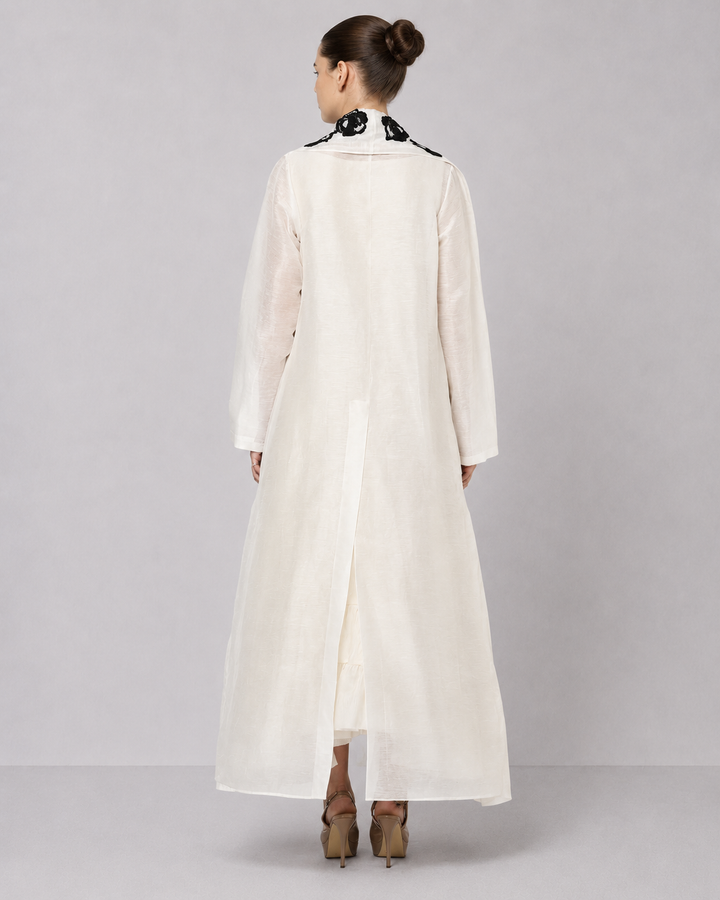 Ivory Tiered Dress With Floral Embroidered Bodice And Statement Applique Jacket.