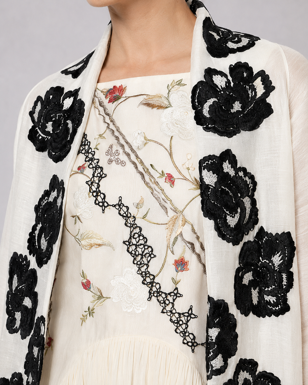 Ivory Tiered Dress With Floral Embroidered Bodice And Statement Applique Jacket.