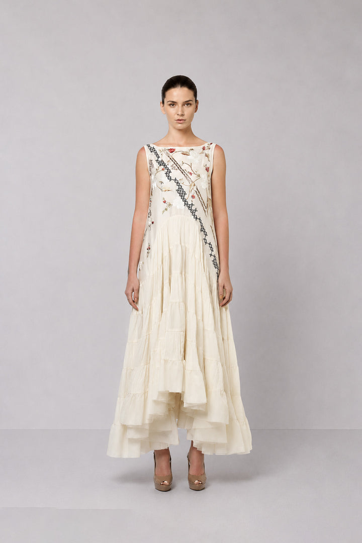 Ivory Tiered Dress With Floral Embroidered Bodice And Statement Applique Jacket.