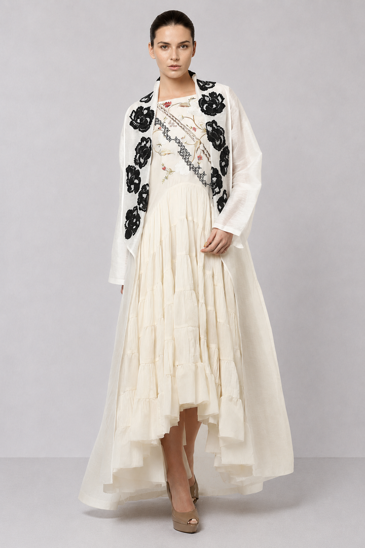 Ivory Tiered Dress With Floral Embroidered Bodice And Statement Applique Jacket.