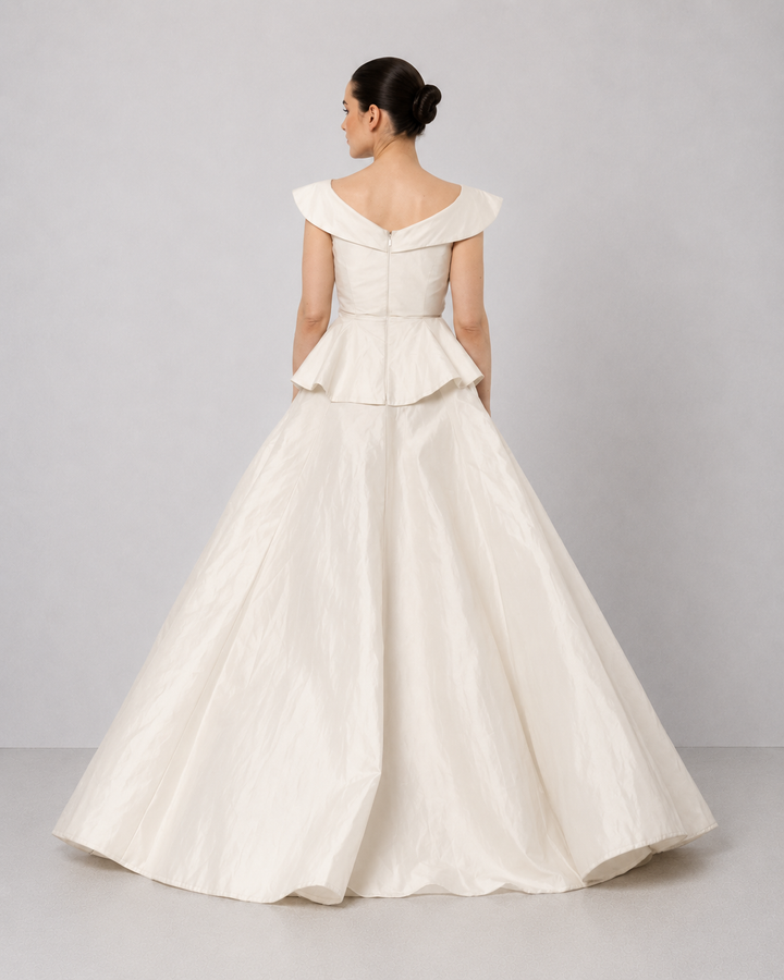 Ivory Floral Embroidered Peplum Gown With An Off-Shoulder Neckline And Voluminous Drape.