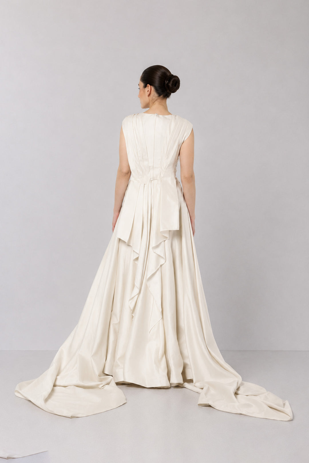 Ivory Embroidered Crossover Gown With Floral Artwork And Dramatic Side Drapes.