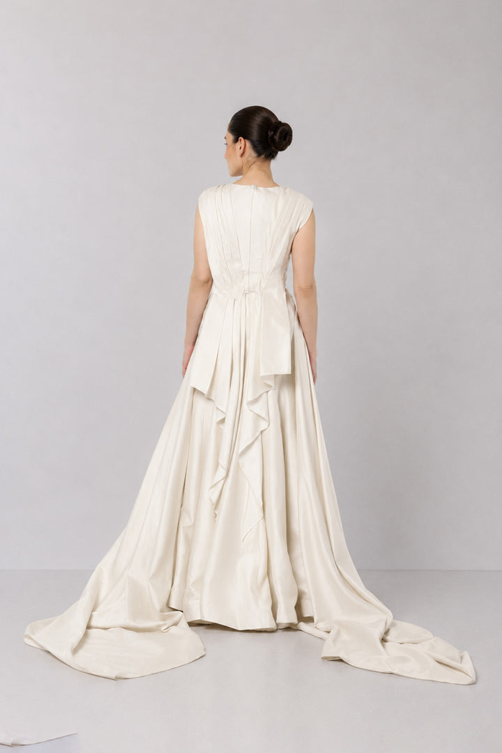 Ivory Embroidered Crossover Gown With Floral Artwork And Dramatic Side Drapes.