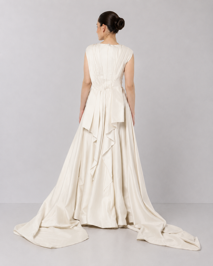 Ivory Embroidered Crossover Gown With Floral Artwork And Dramatic Side Drapes.