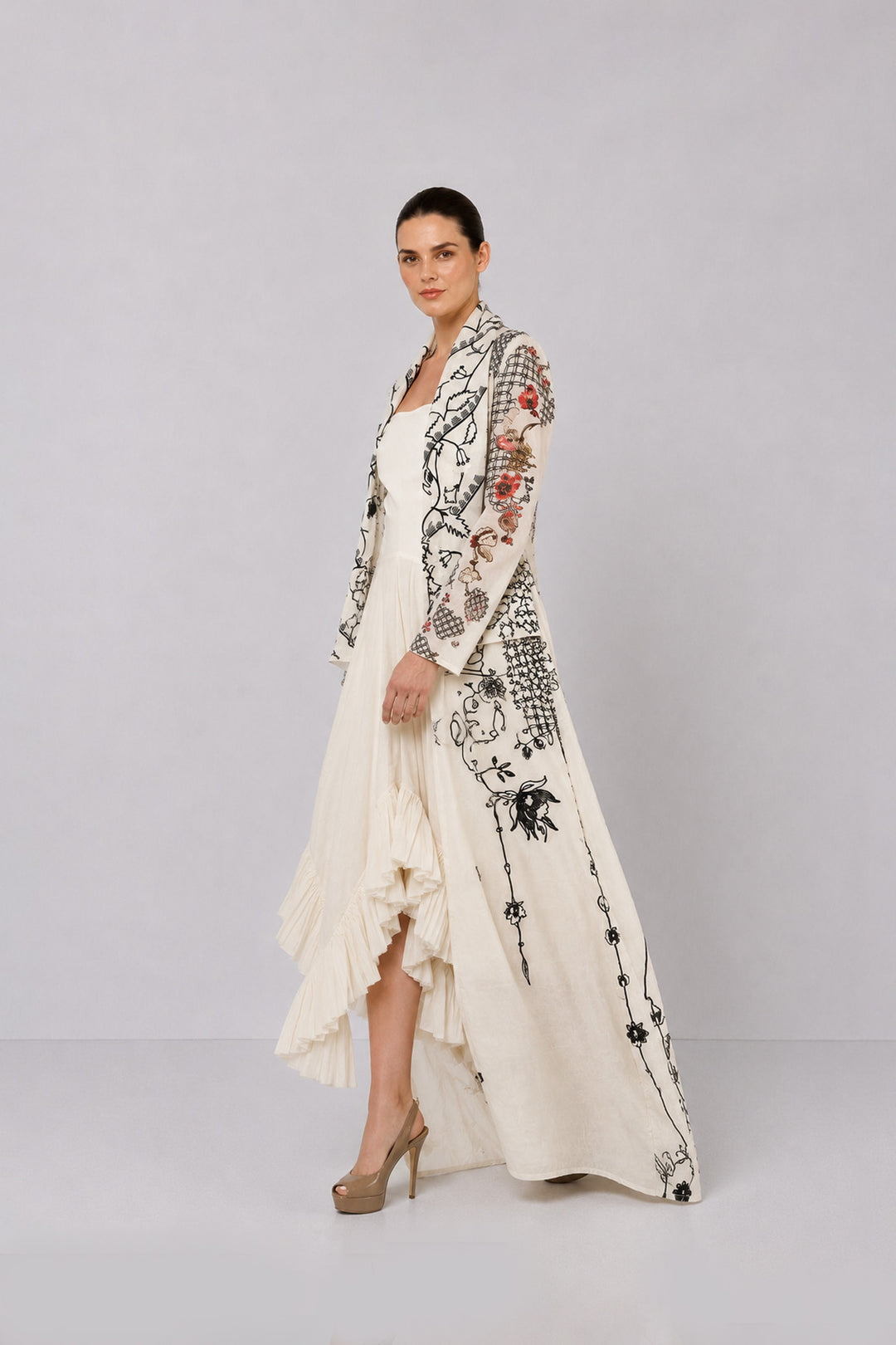 Ivory Draped Dress With Cascading Ruffle Hem And Artistic Embroidered Overcoat.
