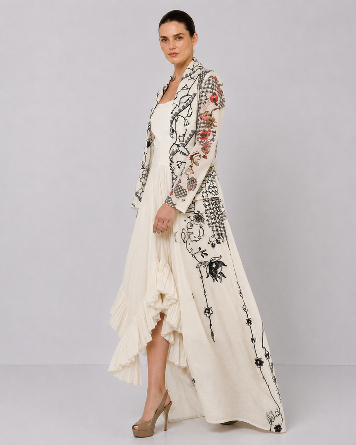 Ivory Draped Dress With Cascading Ruffle Hem And Artistic Embroidered Overcoat.