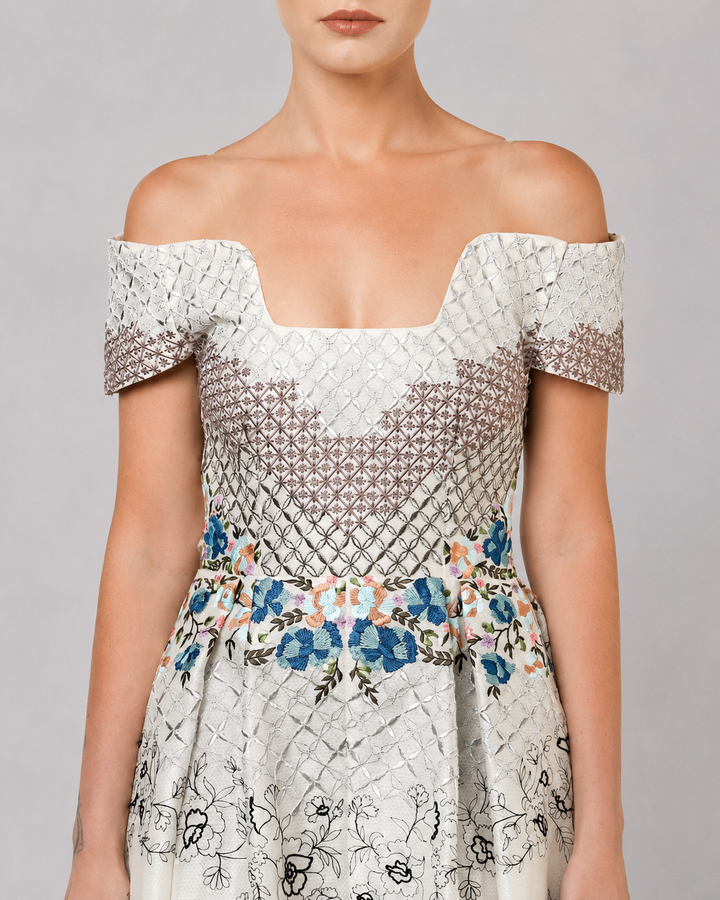 Ivory Off-Shoulder Dress With Embroidered Bodice And Dramatic High-Low Hem.