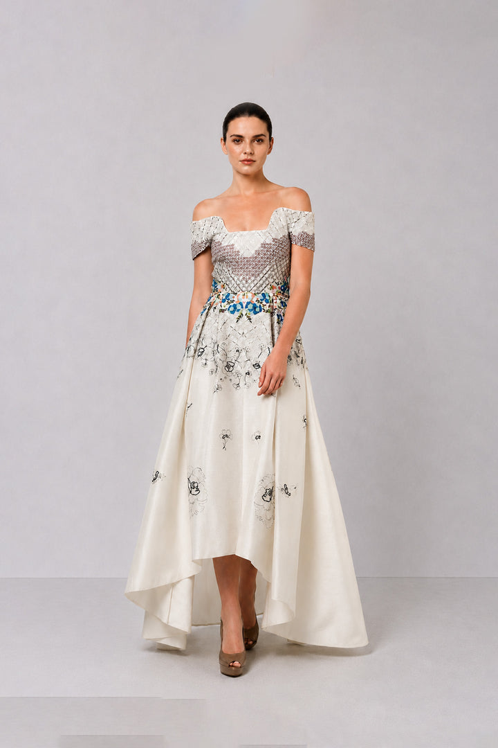Ivory Off-Shoulder Dress With Embroidered Bodice And Dramatic High-Low Hem.