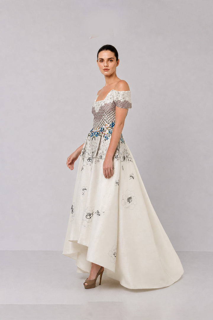 Ivory Off-Shoulder Dress With Embroidered Bodice And Dramatic High-Low Hem.