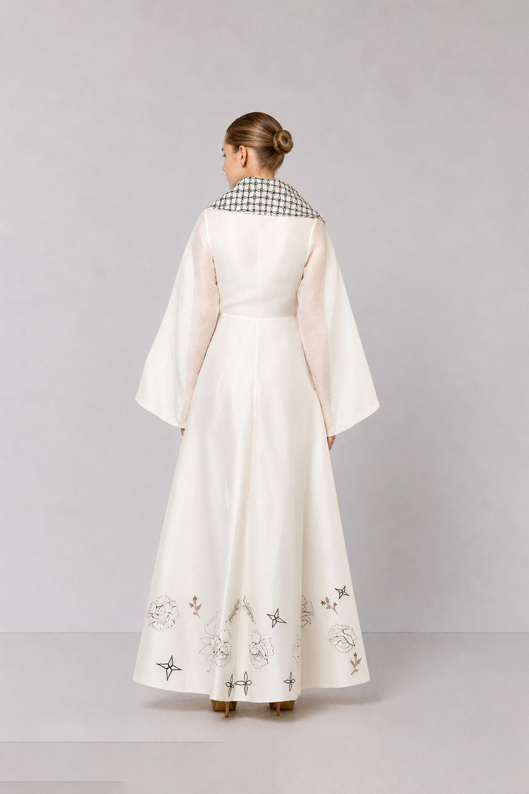 Ivory Wrap Gown With Statement Embroidered Collar And Sheer Bell Sleeves.