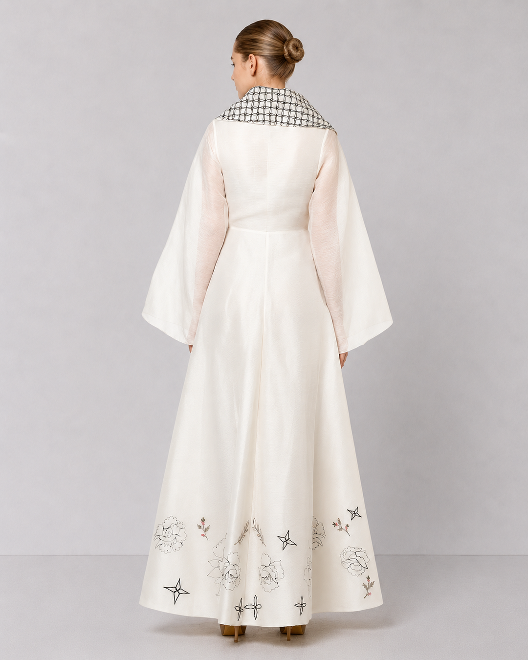 Ivory Wrap Gown With Statement Embroidered Collar And Sheer Bell Sleeves.