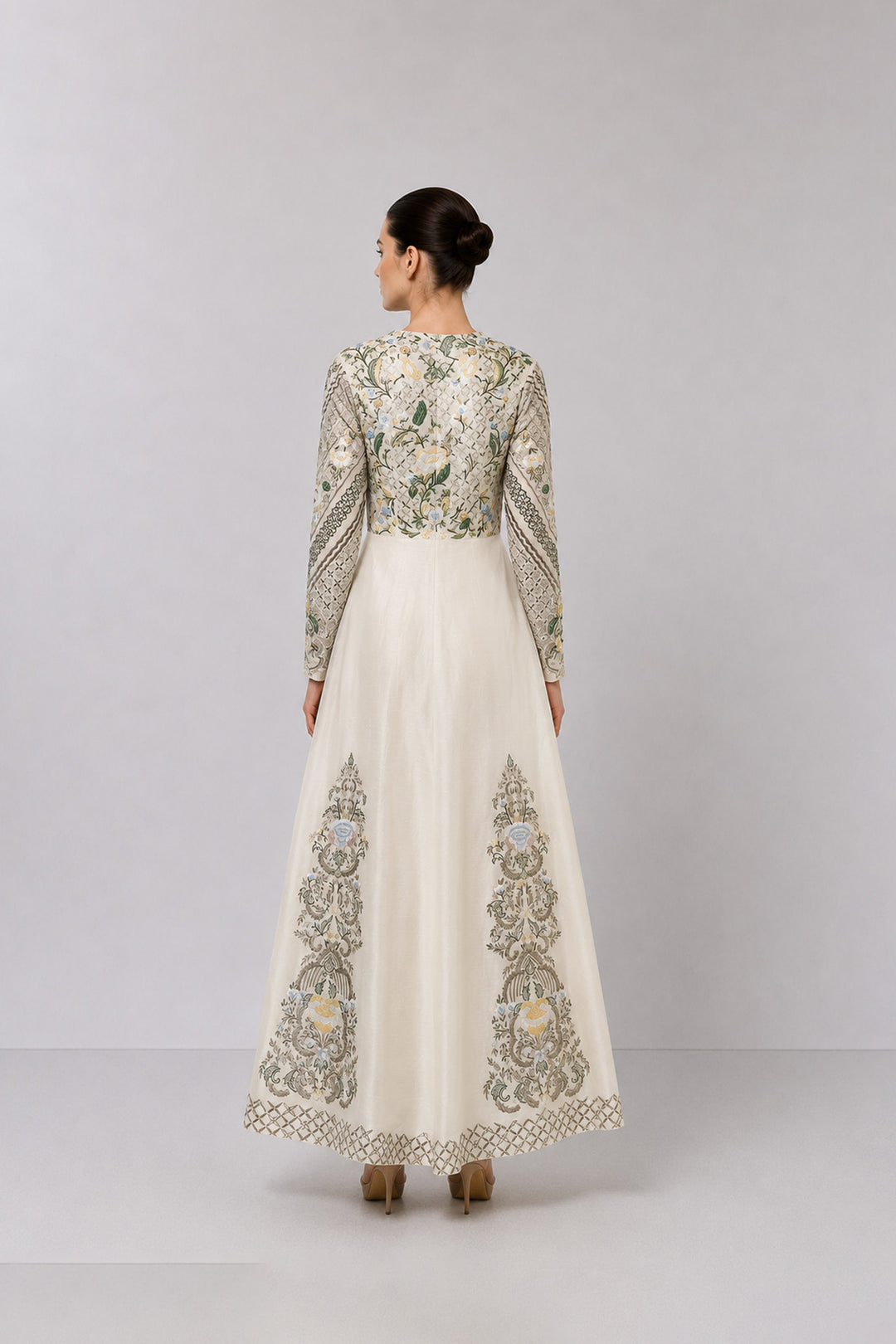 Ivory Embroidered Gown With Pastel Floral Motifs And Elegant V-Neckline.