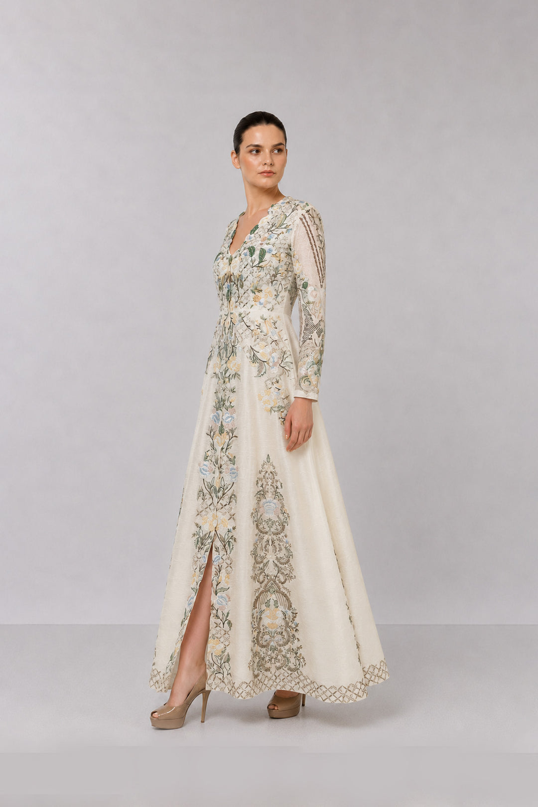 Ivory Embroidered Gown With Pastel Floral Motifs And Elegant V-Neckline.