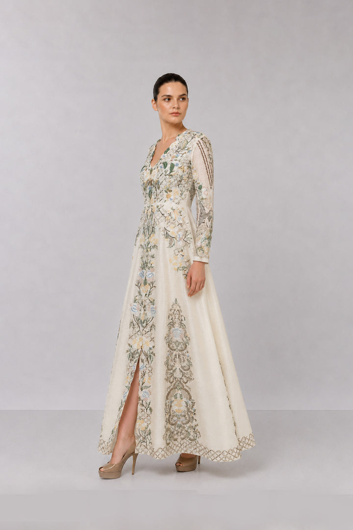 Ivory Embroidered Gown With Pastel Floral Motifs And Elegant V-Neckline.