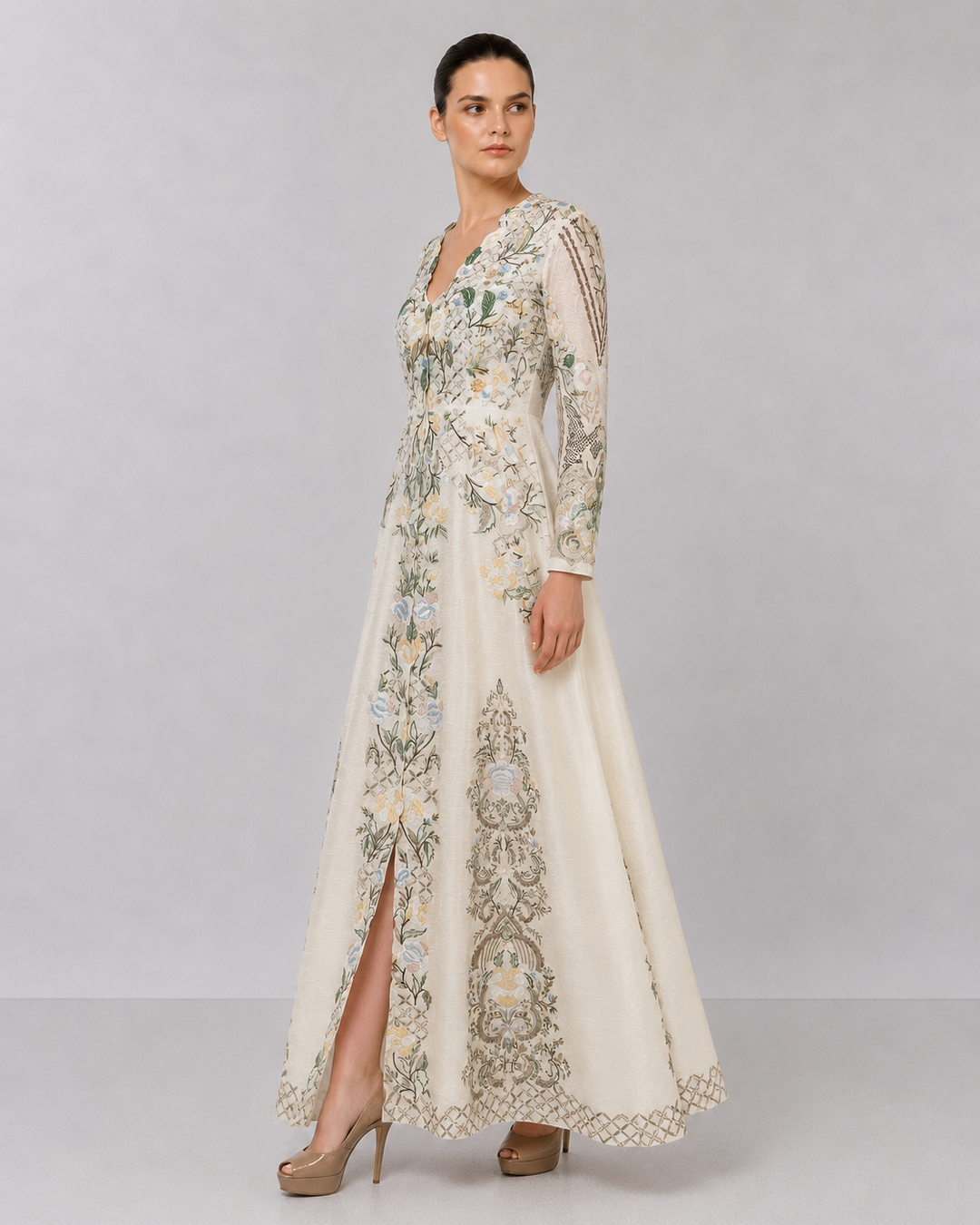 Ivory Embroidered Gown With Pastel Floral Motifs And Elegant V-Neckline.