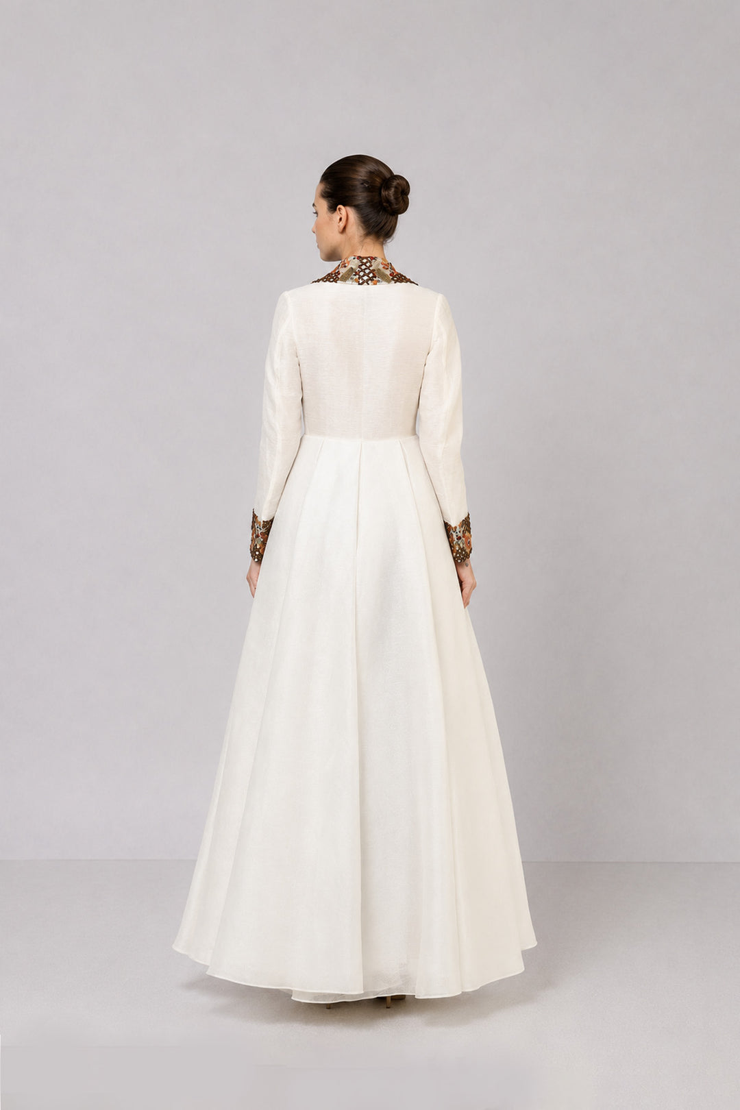 Ivory A-Line Gown With Embroidered Lapel Collar And Statement Cuffs.